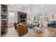 Bright and airy living room with fireplace, decorative ceiling, and hardwood flooring at 4412 Foxview Ct, Charlotte, NC 28270