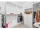 This walk-in closet features custom shelving, hanging racks, and drawers for optimal storage and organization at 4412 Foxview Ct, Charlotte, NC 28270