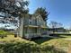 Inviting two-story home with a covered front porch and well-kept lawn at 501 E Lafayette St, Salisbury, NC 28144