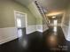 The Foyer boasts dark hardwood flooring and elegant wall trim at 501 E Lafayette St, Salisbury, NC 28144