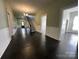 Spacious foyer with beautiful hardwood floors, staircase and classic trim work at 501 E Lafayette St, Salisbury, NC 28144