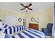 Nautical-themed bedroom with twin beds and coastal decor, creating a charming and inviting space at 5039 Folly Ln, Fort Mill, SC 29707