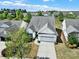 Charming single-Gathering home featuring a well-manicured lawn, two-car garage, and inviting curb appeal at 5039 Folly Ln, Fort Mill, SC 29707