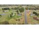 Overhead view of home on large lot with several trees in quiet neighborhood at 5110 Old Still Ln, Bessemer City, NC 28016
