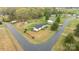 Aerial shot of a one-story home with a big yard, located on a corner lot at 5110 Old Still Ln, Bessemer City, NC 28016
