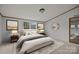 Comfortable bedroom with a large bed, soft lighting, and decorative accents at 5110 Old Still Ln, Bessemer City, NC 28016
