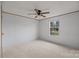 Carpeted bedroom with neutral paint and a window offering natural light and views of the surrounding area at 5110 Old Still Ln, Bessemer City, NC 28016