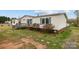 Cozy home with charming shutters and mature landscaping, offering great curb appeal at 5110 Old Still Ln, Bessemer City, NC 28016