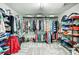 Spacious walk-in closet with ample shelving, hanging rods, and carpeted floor at 517 Bertram Rd, Fort Mill, SC 29708