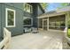 View of deck with seating area, access to screen porch and backyard views at 5416 Woodcreek Dr, Charlotte, NC 28226