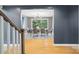 Elegant dining room with modern chandelier, hardwood floors, and a picturesque window view of the outdoors at 5416 Woodcreek Dr, Charlotte, NC 28226