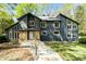 Charming home featuring a well-manicured lawn, walkway, and stone accents at 5416 Woodcreek Dr, Charlotte, NC 28226