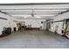 Spacious garage with epoxy flooring, ample storage, and an organized layout at 5416 Woodcreek Dr, Charlotte, NC 28226