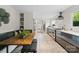 Kitchen with modern appliances and lighting, breakfast nook, and access to stairs at 5416 Woodcreek Dr, Charlotte, NC 28226