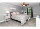 Comfortable bedroom featuring soft gray walls, plush carpeting, and a well-lit space at 6013 Coaching Inn Ct, Charlotte, NC 28270