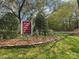 Bishops Ridge community sign with well-maintained landscaping, announcing the clubhouse and amenities at 6013 Coaching Inn Ct, Charlotte, NC 28270