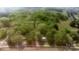 Aerial view of the property surrounded by lush, dense trees and farmland at 751 & 767 Pettit Rd, Catawba, SC 29704