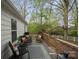An outdoor seating area with comfortable chairs and a beautiful view of the forest at 751 & 767 Pettit Rd, Catawba, SC 29704