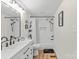 Bright bathroom features a white vanity, a sleek faucet, and a shower with black trim at 751 & 767 Pettit Rd, Catawba, SC 29704
