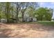 Charming home exterior featuring mature trees, a carport, and well-maintained grounds at 751 & 767 Pettit Rd, Catawba, SC 29704
