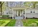 Charming home with a brick facade, covered porch, and landscaped front yard creates welcoming curb appeal at 751 & 767 Pettit Rd, Catawba, SC 29704