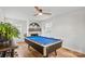 Bright game room featuring pool table, bicycle table, and fireplace at 751 & 767 Pettit Rd, Catawba, SC 29704
