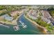 Picturesque aerial view showcases waterfront community with docks, water access, and well-maintained grounds at 7836 Village Harbor Dr, Cornelius, NC 28031