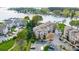 Breathtaking aerial view of lakeside condos with ample parking and meticulously maintained landscaping at 7836 Village Harbor Dr, Cornelius, NC 28031