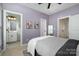 Cozy bedroom with soft carpeting and easy access to an en-suite bathroom at 791 Seigle Point Dr, Charlotte, NC 28204