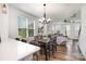 Open floorplan includes dining area with views into the living room at 791 Seigle Point Dr, Charlotte, NC 28204