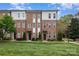 Attractive brick townhome with manicured lawn and landscaping at 791 Seigle Point Dr, Charlotte, NC 28204