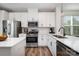Bright kitchen includes stainless steel appliances and stylish finishes at 791 Seigle Point Dr, Charlotte, NC 28204