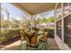 Inviting covered porch with seating area, perfect for relaxing and enjoying the neighborhood views at 8603 Bookwalter Ct, Charlotte, NC 28277