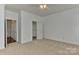 Cozy bedroom with ceiling fan and ample closet space at 9189 Glenashley Dr, Cornelius, NC 28031