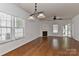 Spacious living room with fireplace and access to outdoor patio at 9189 Glenashley Dr, Cornelius, NC 28031