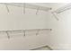 Walk-in closet with wire shelving and neutral colored walls at 9189 Glenashley Dr, Cornelius, NC 28031