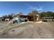 Backyard featuring a brick home, patio, and parking space at 9716 Sunway Dr, Mint Hill, NC 28227