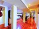 Hardwood floors with natural lighting leading to multiple rooms in the house at 9716 Sunway Dr, Mint Hill, NC 28227