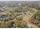 Overhead view of a property surrounded by lush greenery and a golf course, offering scenic living at 10 North Rd, Salisbury, NC 28144