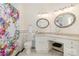 Well-lit bathroom featuring granite countertops, stylish mirrors, and a floral shower curtain at 10 North Rd, Salisbury, NC 28144