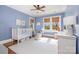 Cozy Bedroom with blue walls, hardwood floors, and plenty of natural light at 10 North Rd, Salisbury, NC 28144