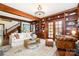 Beautiful living room with hardwood floors, bookshelves, and natural light, next to stairs at 10 North Rd, Salisbury, NC 28144
