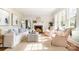 Bright and airy living room with a cozy fireplace and large windows offering natural light at 10 North Rd, Salisbury, NC 28144