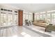 Inviting sunroom featuring brick columns, a tiled floor, and lots of natural light at 10 North Rd, Salisbury, NC 28144