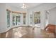 Cozy breakfast nook with large windows and access to the back porch at 125 Cove Creek Loop # 18, Mooresville, NC 28117