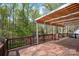 Spacious wooden deck with awning, ideal for outdoor gatherings and relaxation at 125 Cove Creek Loop # 18, Mooresville, NC 28117