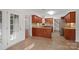 Spacious kitchen featuring custom cabinetry, granite countertops, and stainless steel appliances at 125 Cove Creek Loop # 18, Mooresville, NC 28117