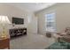 Bedroom featuring neutral paint, carpet, and a ceiling fan with natural light at 13311 Union Square Dr, Huntersville, NC 28078