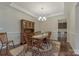 Traditional dining room with hardwood floors, chair railing, and buffet space at 13311 Union Square Dr, Huntersville, NC 28078