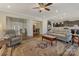 Spacious living room showcasing an open floor plan, hardwood floors and neutral paint at 13311 Union Square Dr, Huntersville, NC 28078